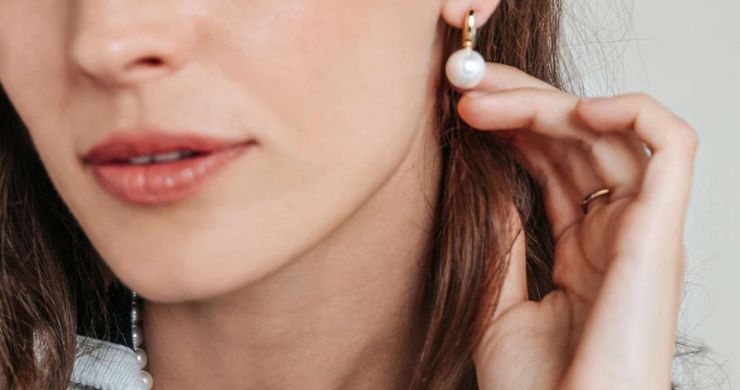  Cultured pearl earrings in 9ct and 18ct gold