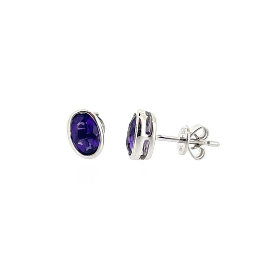 9ct White Gold Oval Amethyst Rubover Set Stud Earrings
