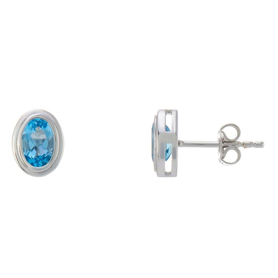 9ct White Gold Oval Blue Topaz Rubover Set Stud Earrings