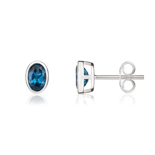 9ct White Gold Oval Blue Topaz Rubover Set Stud Earrings