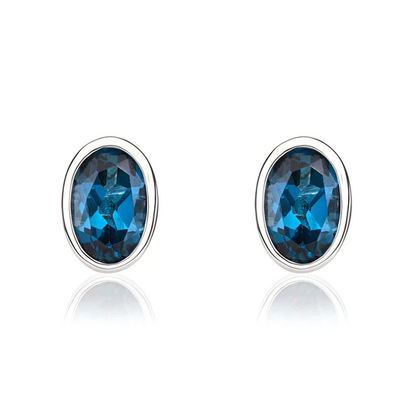 9ct White Gold Oval Blue Topaz Rubover Set Stud Earrings